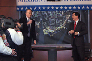 Bill with Stephen Colbert on the set of The Colbert Report.